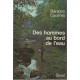 Des hommes au bord de l'eau